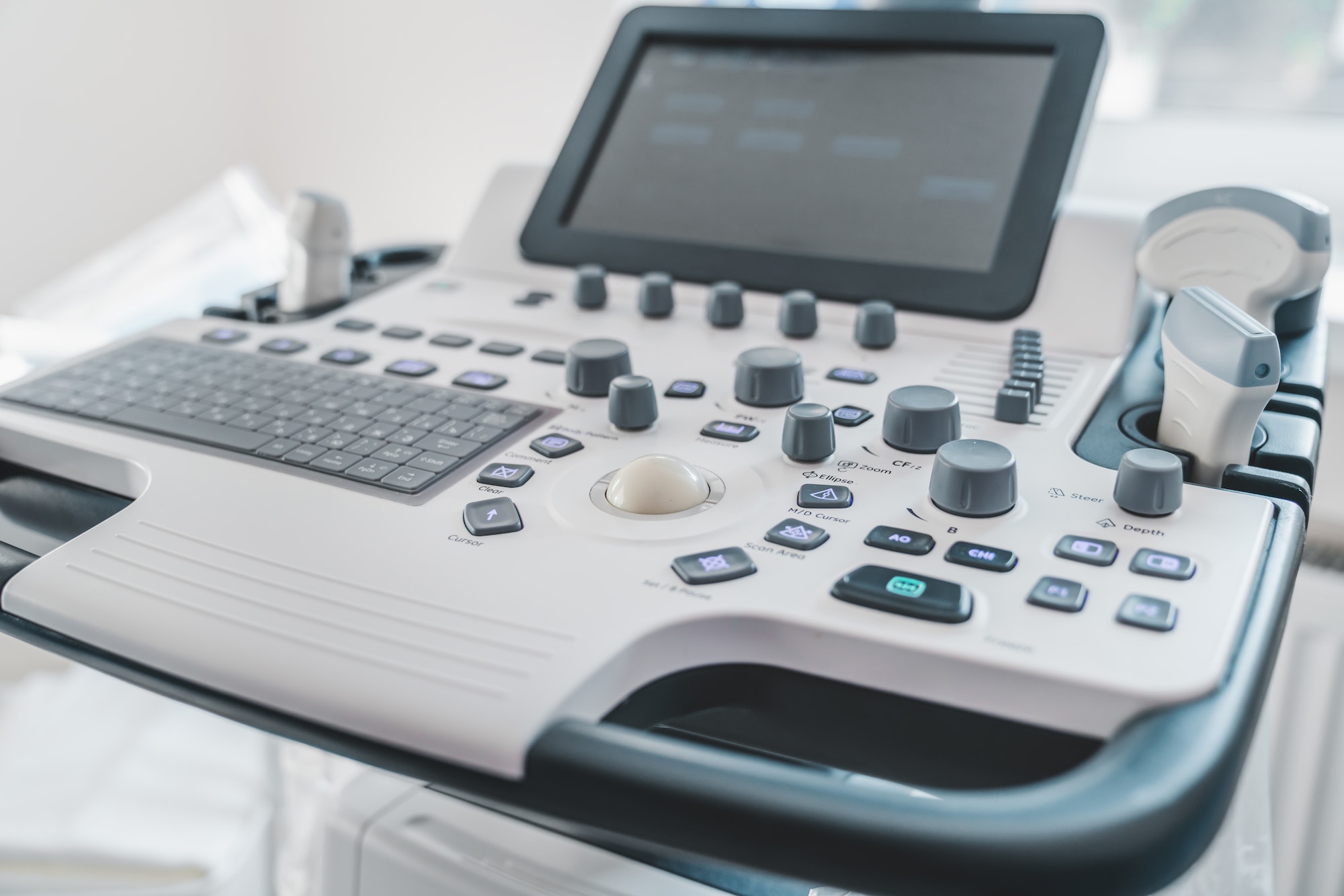 Close up of ultrasound machine in clinic. Health care, diagnostic and disease prevention concept